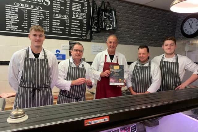 Graham Fidling pictured with staff.