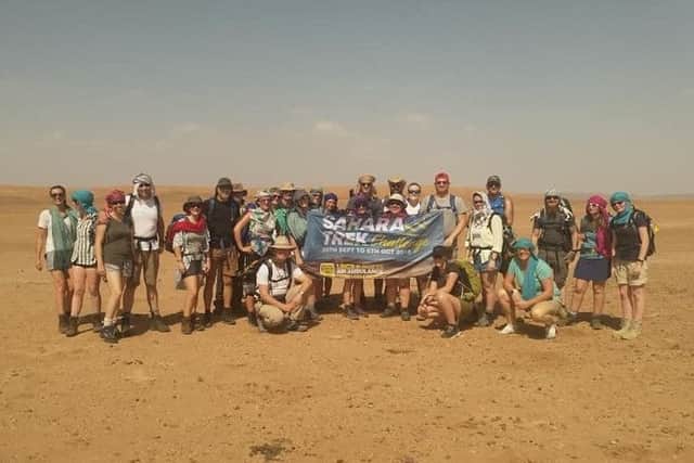 Weve done it! Sue and her fellow trekkers after completing their fundraising walk across the Sahara