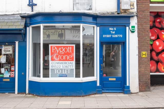 Sign of the times? One of several empty shops on the High Street.