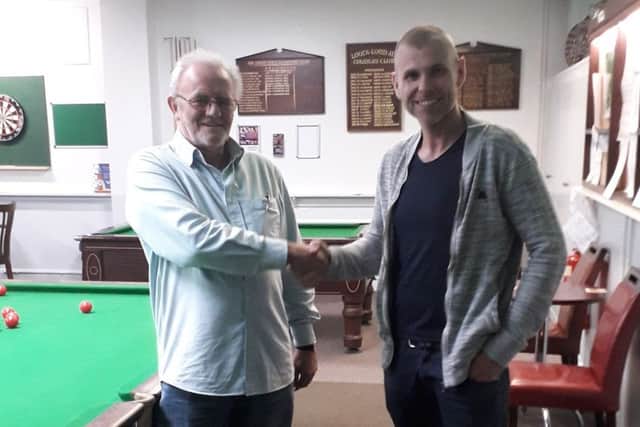 Louth Billiards and Snooker League president Terry Robinson with Mark Parrinder, director of new league sponsors T. Marris Carpets EMN-191021-092024002