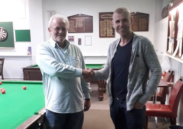 Louth Billiards and Snooker League president Terry Robinson with Mark Parrinder, director of new league sponsors T. Marris Carpets EMN-191021-092024002