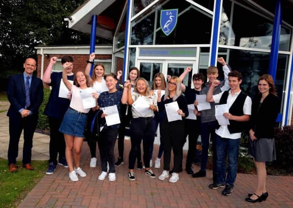 Somercotes Academy staff and students, pictured celebrating their exam result success in the summer