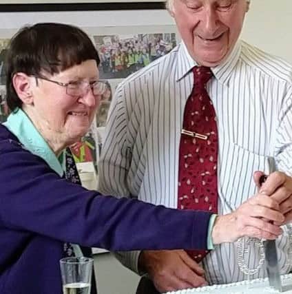 Cutting the celebration cake