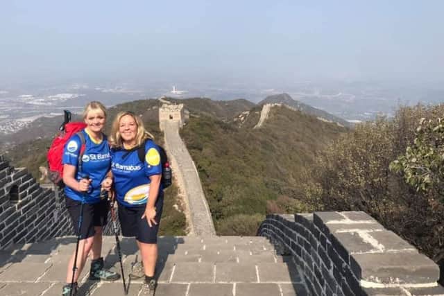 Caroline Swindin and Becca Hooton on the Great Wall EMN-191028-140244001