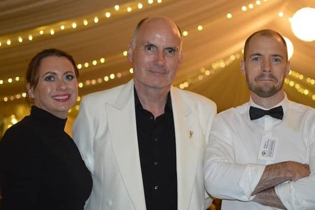 Kenneth Harvey (host) with two of his 'volunteers' - his niece Jenny Spence and his nephew David Clugston.