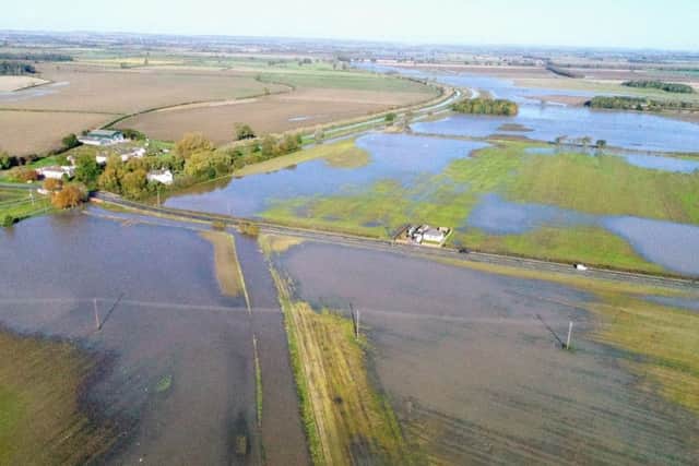 A photo of the flooded A631 road and many acres of farmland at Bishopbridge taken on Sunday. Picture: Julian Anyan EMN-191029-094355001