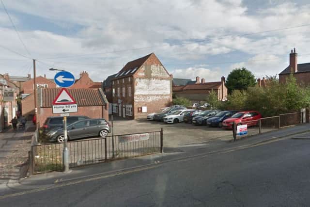 The proposed development site, off Pawnshop Passage.