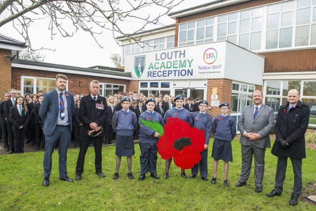 Louth Academy Armistice Day: Two minute silence and The Last Post played by ex-RAF serviceman Peter Wood from Binbrook. (Picture: Sean Spencer/Hull News & Pictures Ltd).