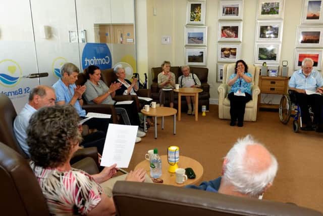 A Singing for Health get-together in the residents lounge at the hospice.