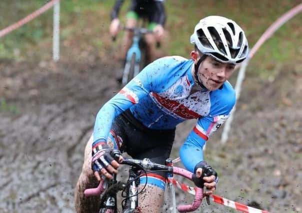 In the thick of it. Jensen racing in typical cyclo-cross conditions EMN-191114-103925002