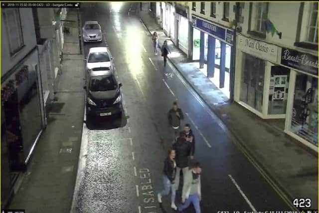 Do you recognise the young man, wearing a grey hoodie and blue jeans?