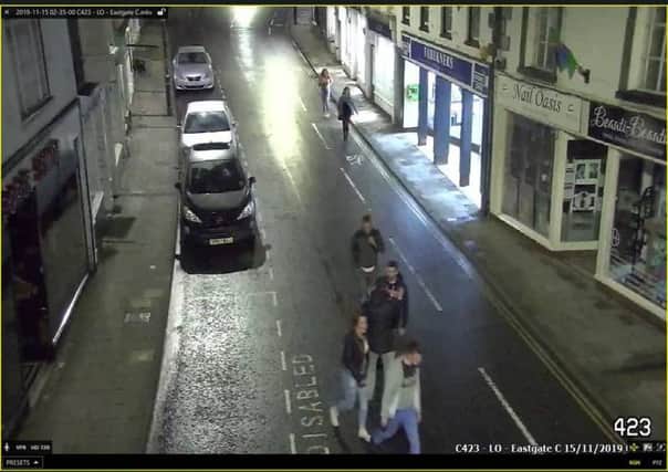 Do you recognise the young man, wearing a grey hoodie and blue jeans?