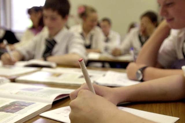 Pupils in a classroom (stock image)