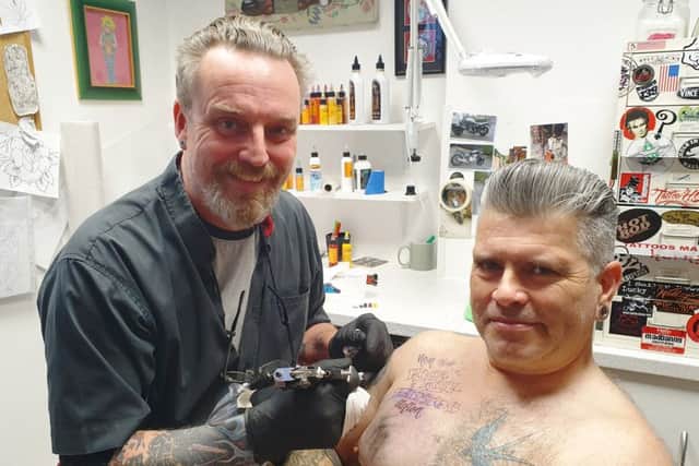 Lee Crosskill with loyal customer Keith McNally - who returned for a 10th anniversary tattoo last week!