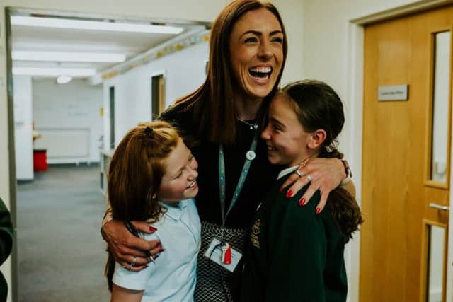 Executive principal Emma Beveridge with pupils