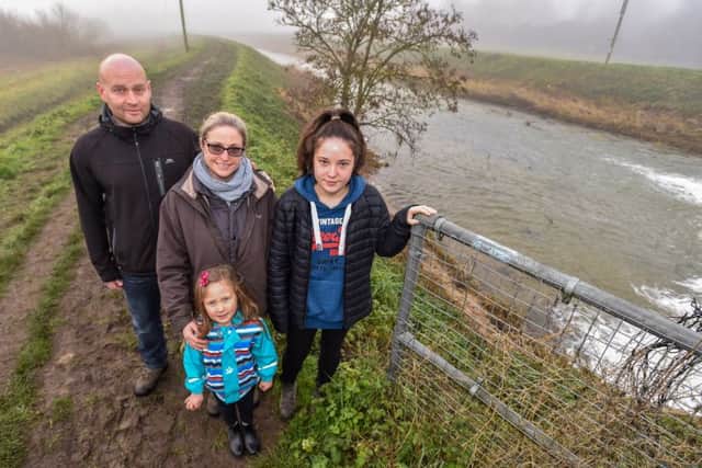 Michael Poole, wife Charlotte and children Edie Dunworth (13) and
Tilly (5) at the scene of the seal drama EMN-191231-095948001