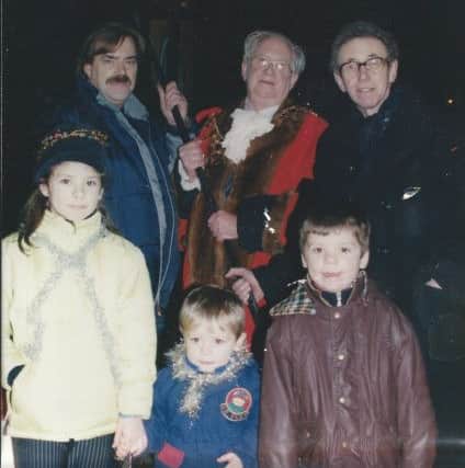 Lucy Young (7), George Young (5) and Charlie Young (2) helped the mayor to light the Millenium Beacon in Park Avenue, Louth.