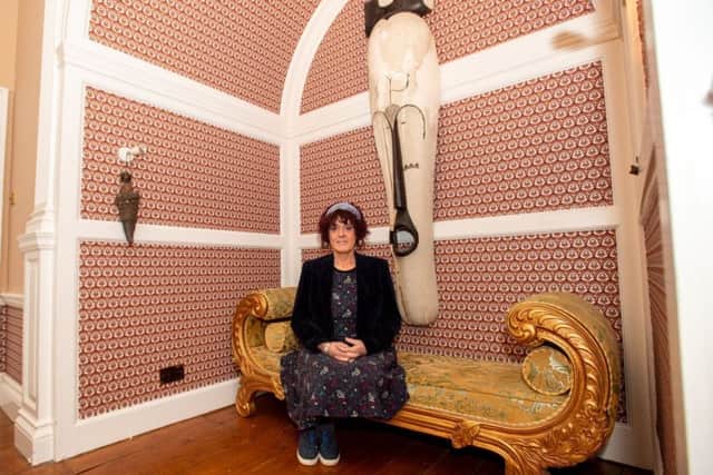 The owner, Brenda Hobbin, in one of the many amazing rooms.