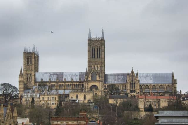 Pictured is the RAF Typhoon flying over Lincoln Cathedral this morning (Friday). EMN-200124-142124001