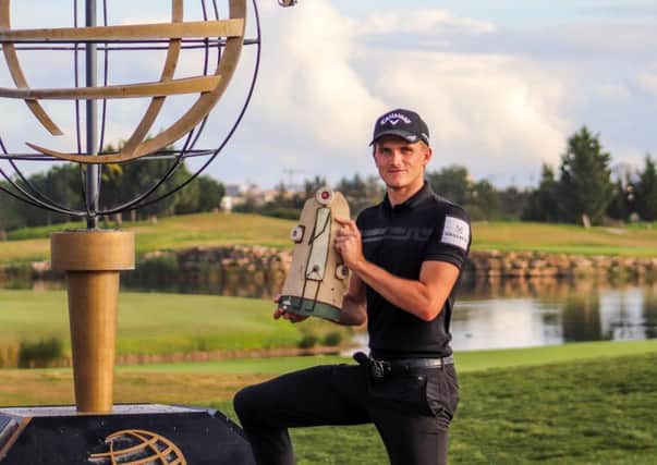 The first trophy of the season. Turner after completing victory at the Dom Pedro Victoria Open in Portugal. Picture: Berto Granja EMN-200302-102637002