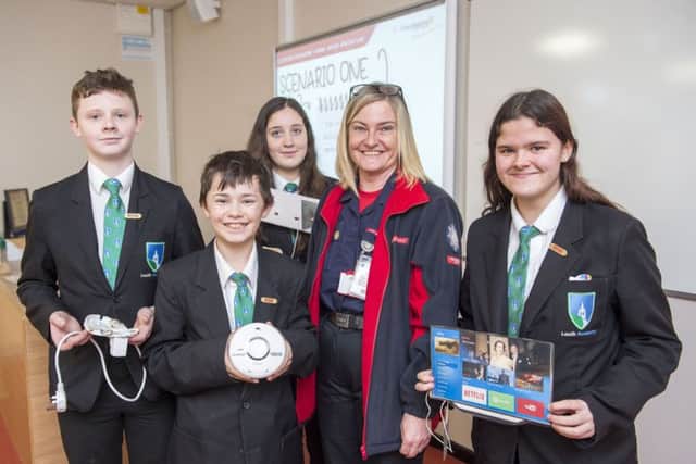 Sally Cheetham, from Lincolnshire Fire and Rescue, with Leon Mison, Joshua Jackson, Erin Ames, and Skye-Paige Robertshaw. (Picture: Sean Spencer/Hull News & Pictures Ltd.)