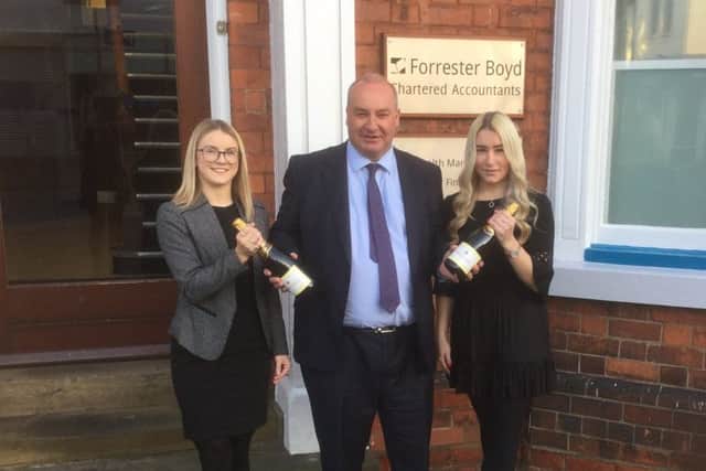 Ellie Robinson (Grimsby branch) and Emma De Halle (Louth branch) alongside Forrester Boyd Partner, David Everatt.