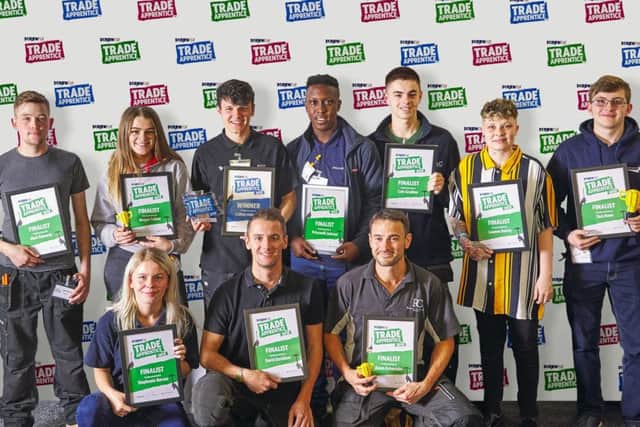Winner Callum Abberley (back, third from left) alongside other finalists from Screwfix's Top Trade Apprentice competition last year.