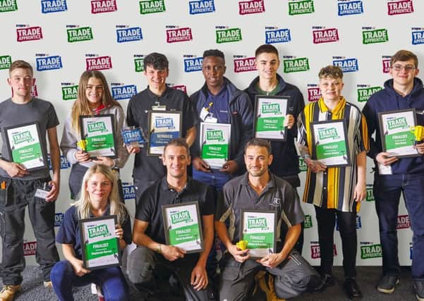 Winner Callum Abberley (back, third from left) alongside other finalists from Screwfix's Top Trade Apprentice competition last year.