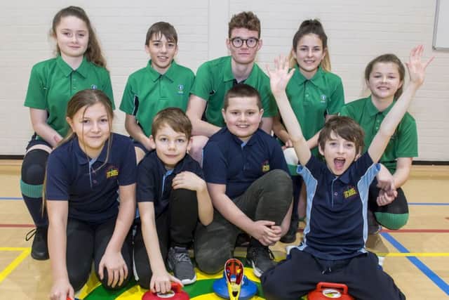Grasby All Saints Primary School pupils are pictured with Louth Academy sports leaders. From left, back - Jess Clark, Jamie Smith, Dexter Chapman, Rachel Booth and Grace Smith; front - Ruby Carter, Cameron McKee, Harrison Holmes and Charley Glasgow .
Picture: Sean Spencer/Hull News & Pictures EMN-200227-123306002