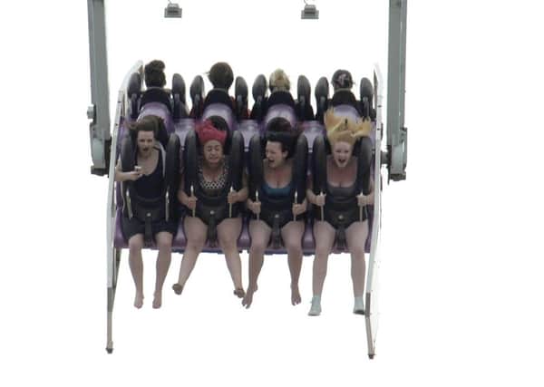 Standard reporter Rachel Grafton (left) on the 2Xtreme ride at Boston May Fair, pictured with other ride users L-R Megan Buchanan, Sophie Giddins, Sophie Leyshon.