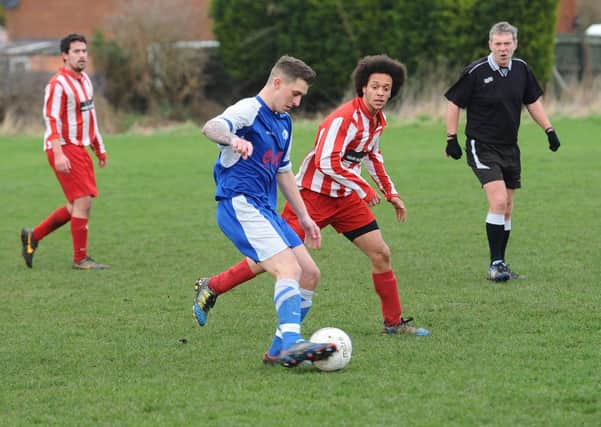Richard Stukins is pictured on the ball during Swineshead Reserves' 2-1 victory over Spalding Harriers.