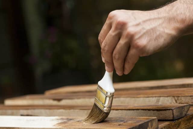 A Generic Photo of a wooden shelf being painted. See PA Feature HOMES Homes Column. Picture credit should read: PA Photo/thinkstockphotos. WARNING: This picture must only be used to accompany PA Feature HOMES Homes Column. EMN-141203-135249001