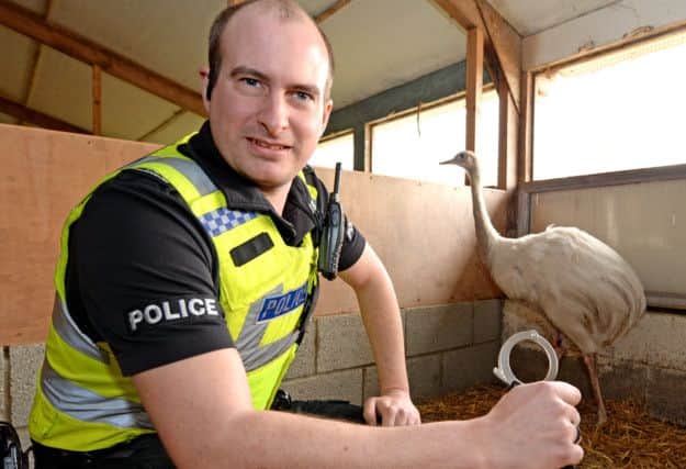PC Tom Harrison with the Emu EMN-140319-151340001