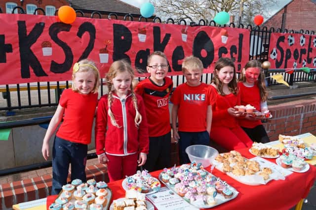 Getting ready for the Sport Relief Bake Off at Legsby EMN-140324-122925001