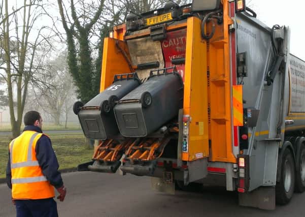 Dustbin collections in North Kesteven. EMN-140325-145308001