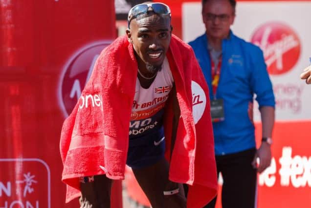 File photo dated 13/04/2014 of Great Britain's Mo Farah after finishing in eighth place during the Virgin Money London Marathon. PRESS ASSOCIATION Photo. Issue date: Monday April 14, 2014.Mo Farah has vowed to bounce back from his disappointing marathon debut like a champion. See PA story ATHLETICS London. Photo credit should read: John Walton/PA Wire ATHLETICS_London_075510.JPG