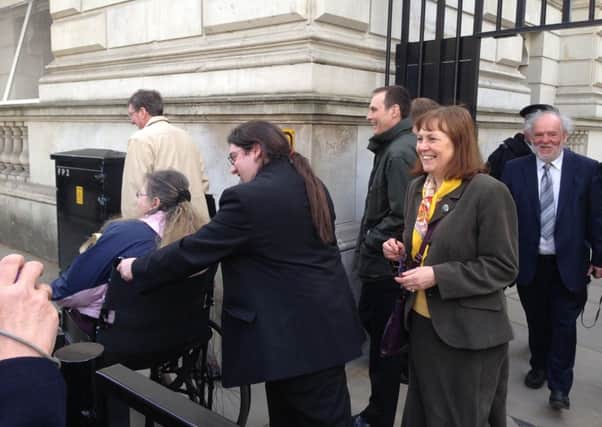 Julie Harrison (right) leaving No 10 Downing Street.