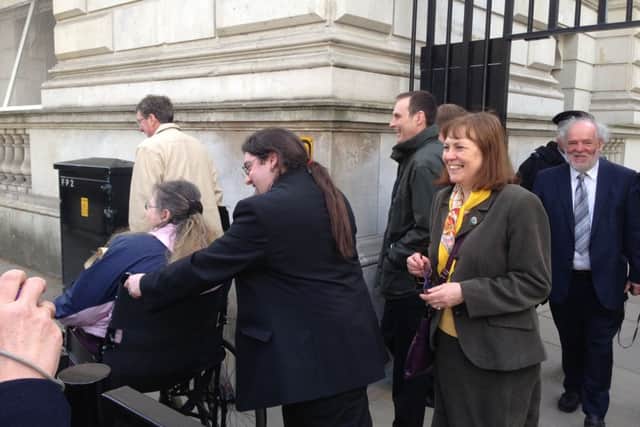 Julie Harrison (right) leaving No 10 Downing Street.