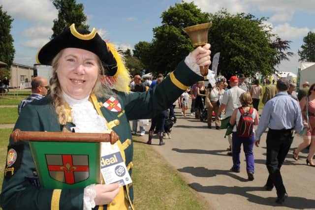 Lincoln's Town Crier Karen Crow at the Federation of small businesses stand.