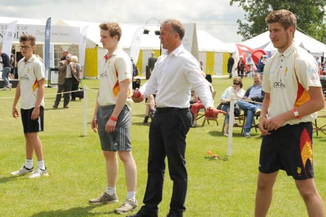 Ex-England cricketer Alec Stewart holding cricket coaching sessions with school pupils. Photo: 180614-17 EMN-140619-120831001
