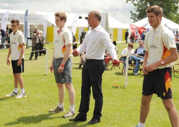 Ex-England cricketer Alec Stewart holding cricket coaching sessions with school pupils. Photo: 180614-17 EMN-140619-120831001
