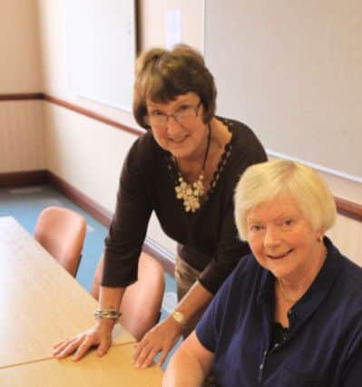 Councillor Doreen Stephenson, Leader of the Council, signs the tobacco declaration in the presence of Portfolio Holder for Communities, Councillor Sandra Harrison. EMN-141209-104748001