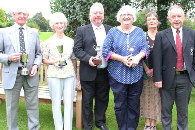 Gwilym and Rosemary Evans, Andy and Jo Partridge, Barbara Vickers (Ladies Captain) and Steve Owen (Captain) EMN-140928-181800001