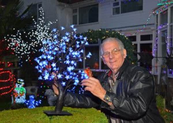 Derek Turner with his display of lights in Wragby