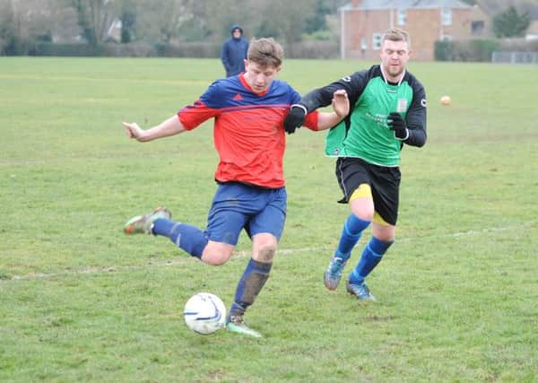 Railway Athletic FC (red) v Pointon A (Green). Danny Woods (red), Dan Smith (green).