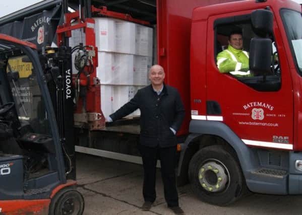 Managing Director of Batemans Brewery Stuart Bateman with a delivery headed overseas.