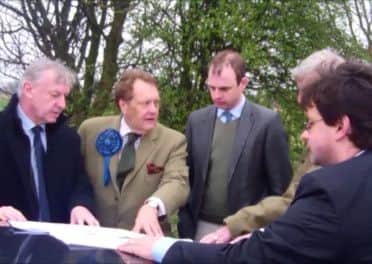 John Hayes looks over the Quadrant plans with David Newton.