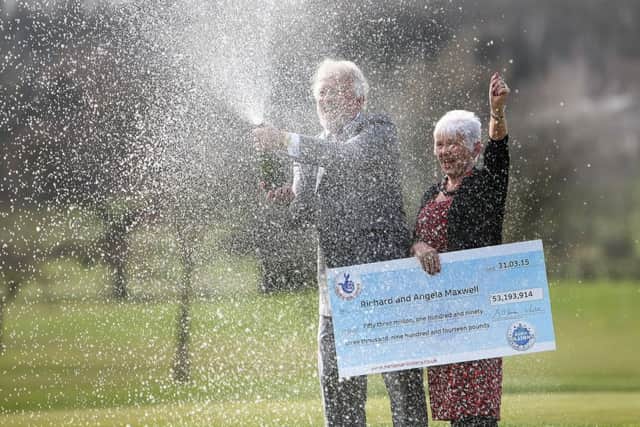 Richard and Angela Maxwell celebrate winning £53 million on the EuroMillions.