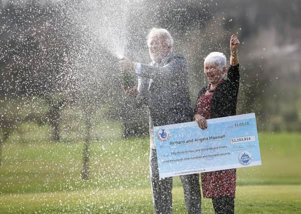 Richard and Angela Maxwell celebrate winning £53 million on the EuroMillions.