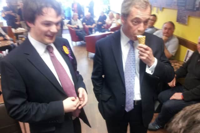 Nigel Farage tucks into an ice cream.